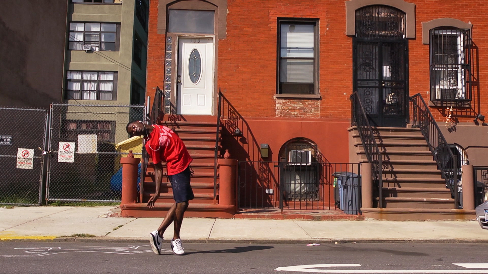 Storyboard P dances on a street in New York